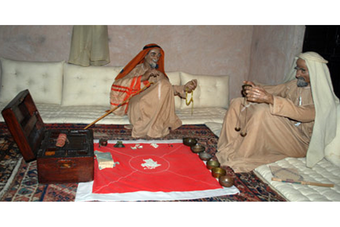 One of the rooms in Ajman Museum, which shows two merchants discussing a price of pearls 