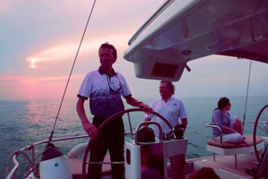 Captain John skippering the yacht